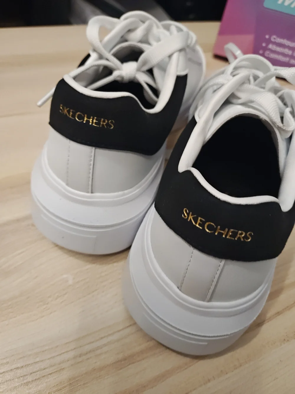 Skechers Men’s White Sneakers with Black Heel Accent 9